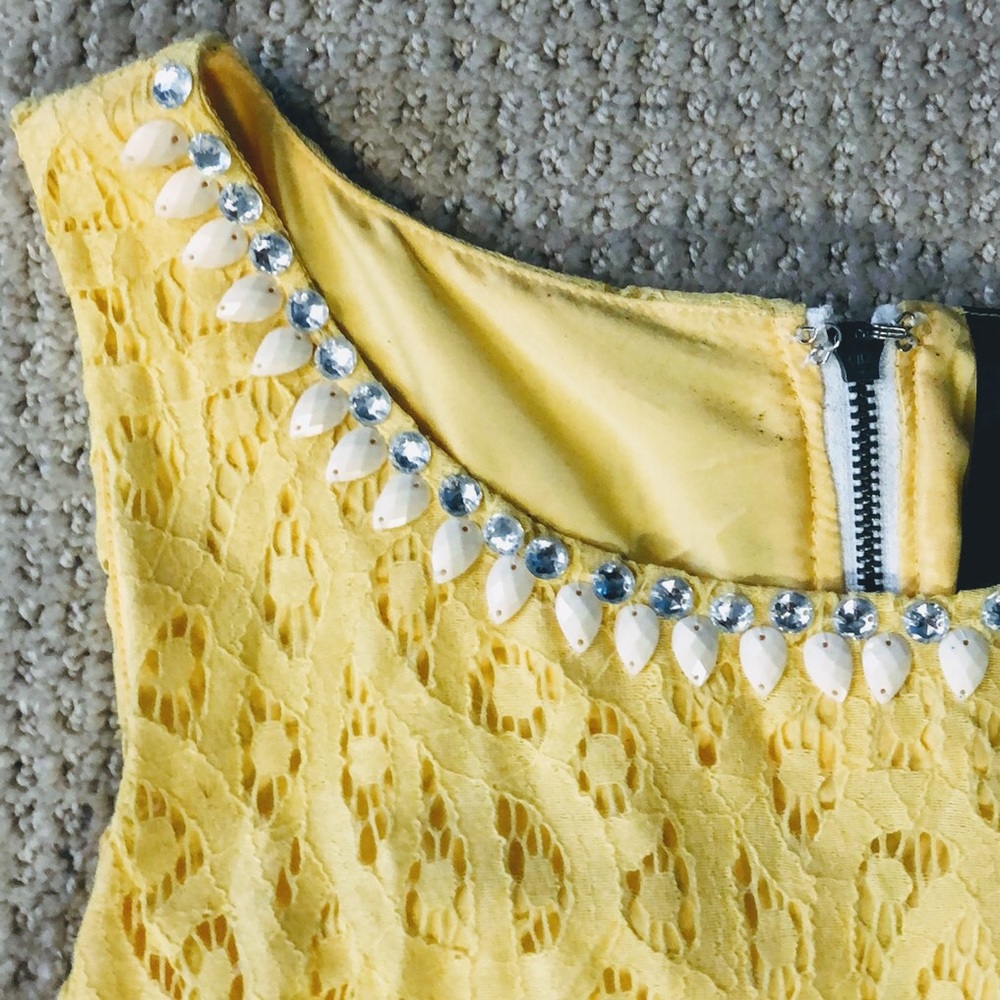 Sleeveless lace dress w beaded neckline
